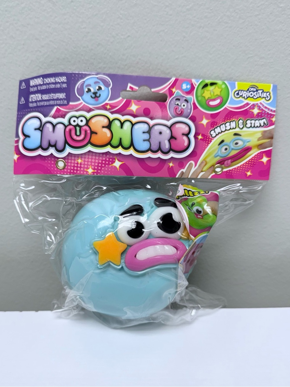 New! Authentic Orb Curiosities Smusher w/ Light Blue Star Face Squishy Toy
